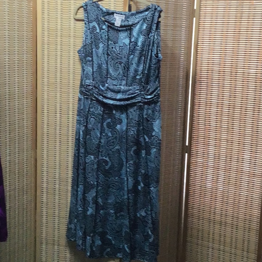 Brand new turquoise and black dress with touched waistline